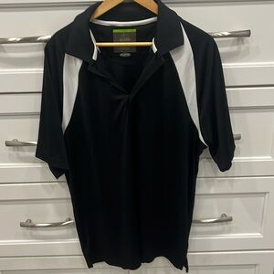 Men’s Greg Norman golf shirt. Size Large. Black & White